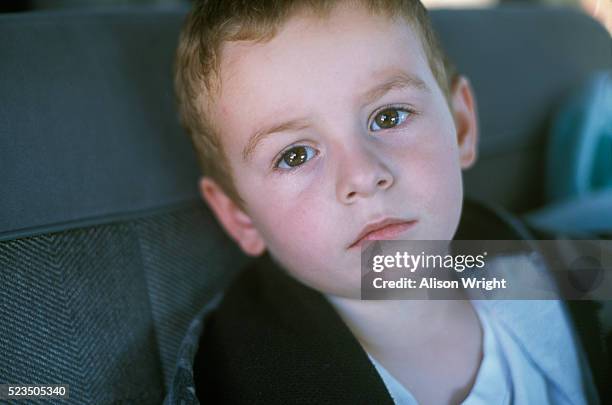 young boy in automobile at food bank - appalachia poverty foto e immagini stock