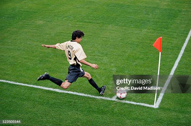 soccer player corner kicking - taking a corner stock pictures, royalty-free photos & images
