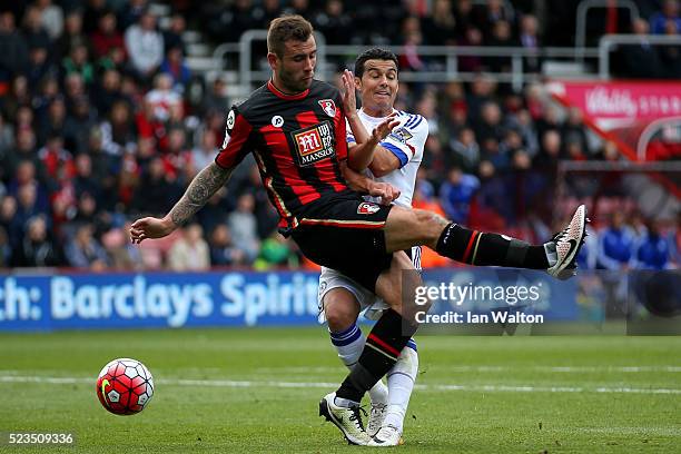 Steve Cook of Bournemouth makes a tackle on Pedro of Chelsea during the Barclays Premier League match between A.F.C. Bournemouth and Chelsea at the...