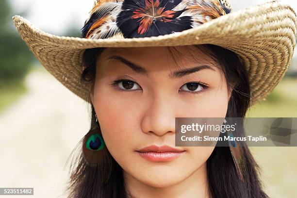 woman raising eyebrow - taunts stock pictures, royalty-free photos & images