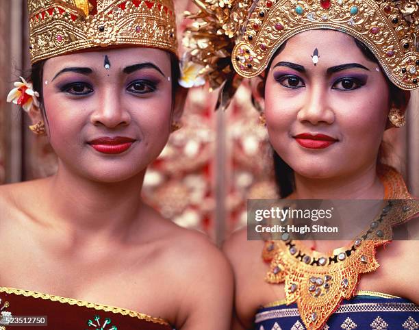 two female folk dancers - barong headdress stock pictures, royalty-free photos & images