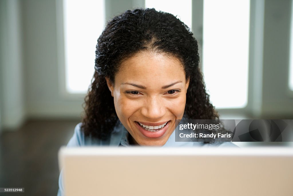 Woman Using Computer High-Res Stock Photo - Getty Images