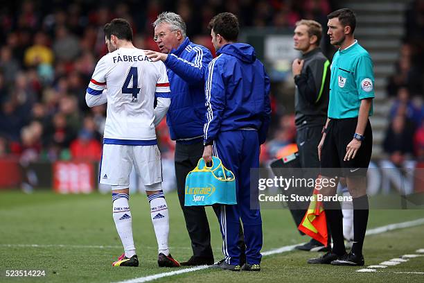 Guus Hiddink interim manager of Chelsea in conversation with Cesc Fabregas of Chelsea during the Barclays Premier League match between A.F.C....