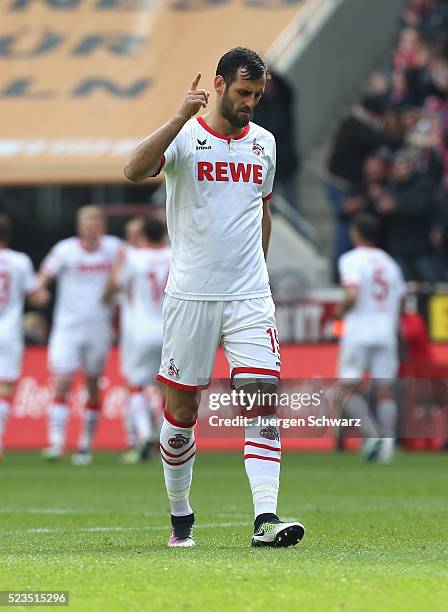 Mergim Mavraj of Cologne lifts his arm after the fourth goal of his team during the Bundesliga match between 1. FC Koeln and SV Darmstadt 98 at...