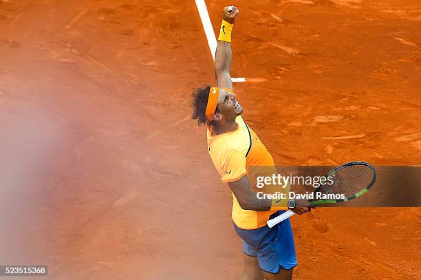 Rafael Nadal of Spain celebrates defeating Philipp Kohlschreiber of Germany during day six of the Barcelona Open Banc Sabadell at the Real Club de...
