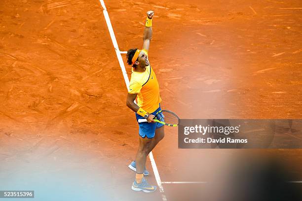 Rafael Nadal of Spain celebrates defeating Philipp Kohlschreiber of Germany during day six of the Barcelona Open Banc Sabadell at the Real Club de...