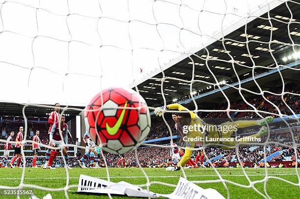 Ashley Westwood of Aston Villa scores past Fraser Forster of Southampton for the second time during the Barclays Premier League match between Aston...