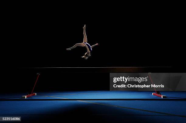 studio shot of gymnast - gymnastics stock pictures, royalty-free photos & images