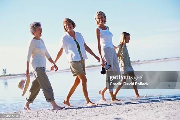 four generations on beach - great grandmother fotografías e imágenes de stock