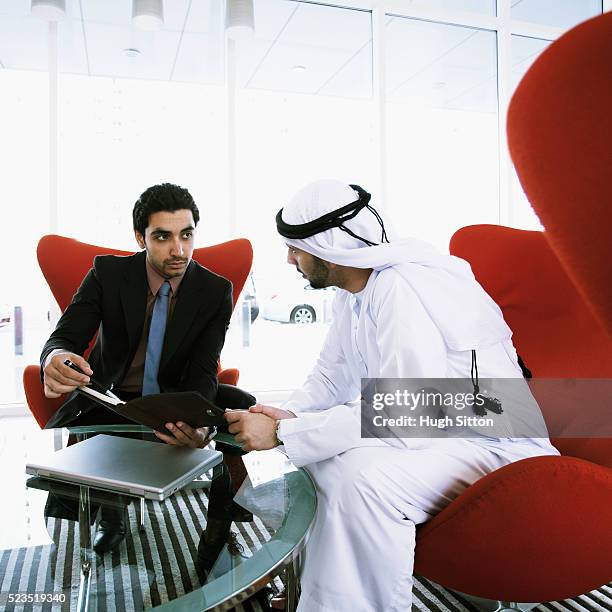 arab businessmen during meeting. u.a.e - arab businessman stock pictures, royalty-free photos & images