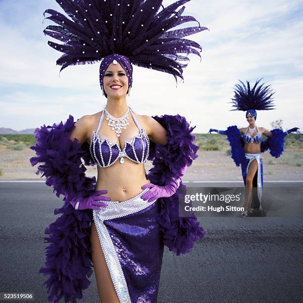 showgirls in the middle of nowhere - purple feather boa stock pictures, royalty-free photos & images
