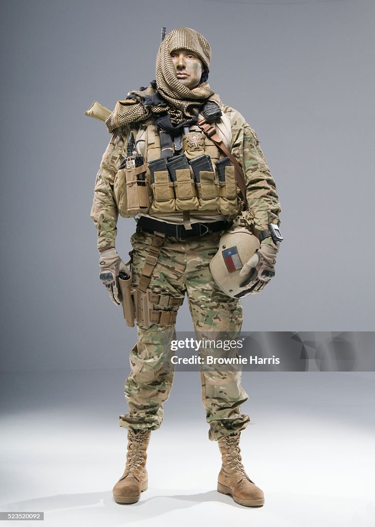 United States Army Airborne Special Forces sniper in camouflage field uniform with Afghan Lungee type headdress