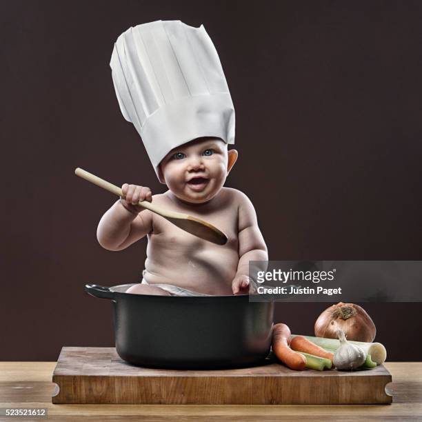 baby girl (1-6 months) cooking in pot - baby chef stock pictures, royalty-free photos & images