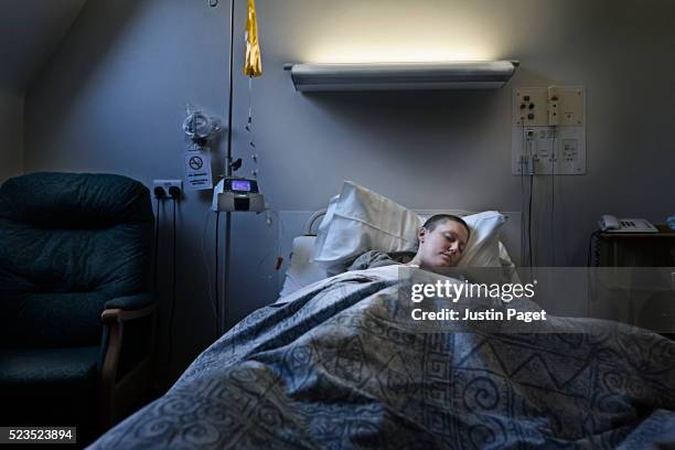 breast cancer patient having chemotherapy treatment - hospital bed with iv stock pictures, royalty-free photos & images