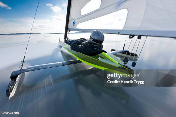 ice yacht in the archipelago - fun snow stockfoto's en -beelden