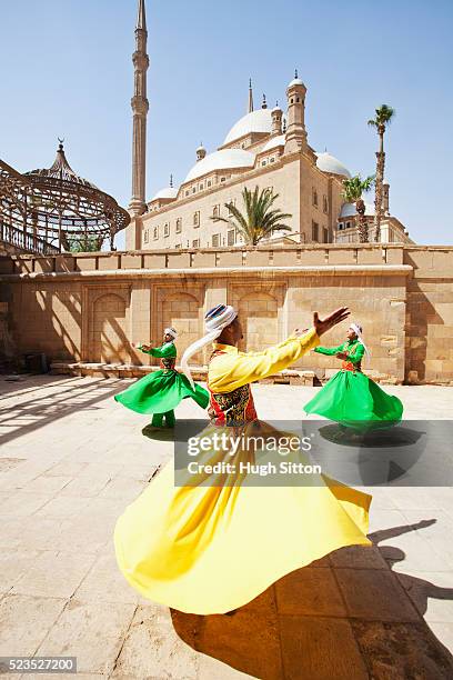 sufi dancers (twirling dervishes) cairo, egypt - sufism stock pictures, royalty-free photos & images