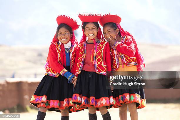 school children wearing traditional peruvian costume, at school. chinchero. peru. - traditional peruvian clothes photos et images de collection
