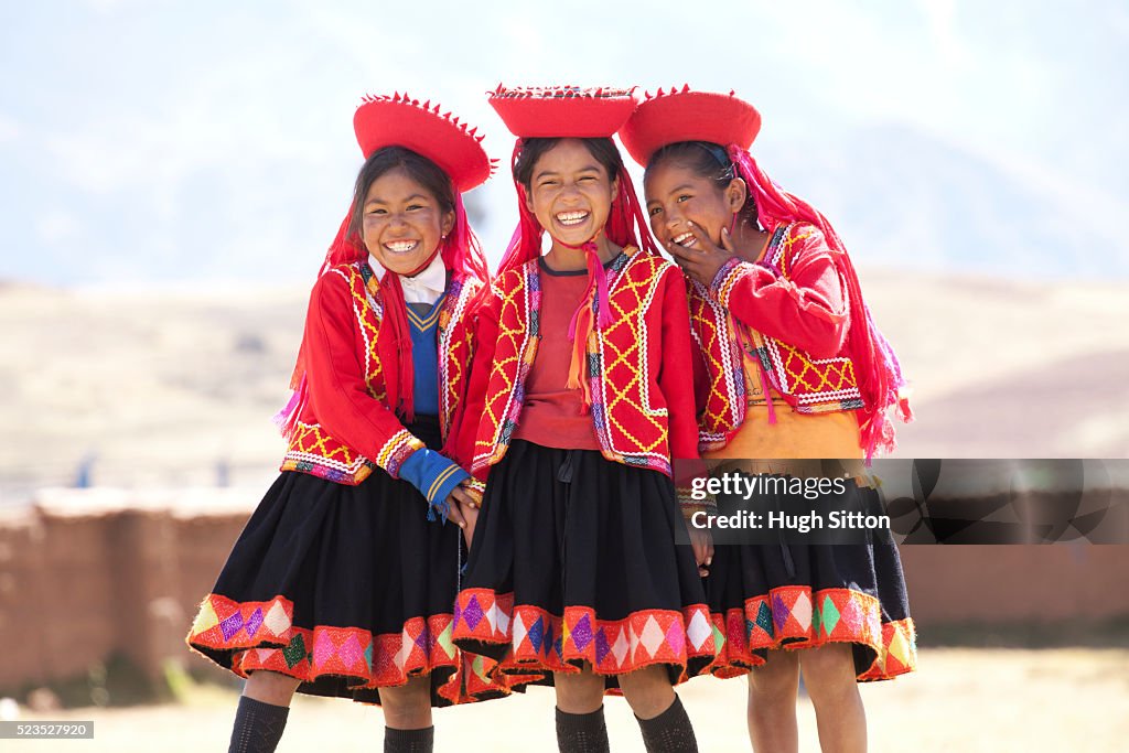 School children wearing traditional peruvian costume, at school. Chinchero. Peru.