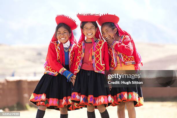 school children wearing traditional peruvian costume, at school. chinchero. peru. - heritage stock pictures, royalty-free photos & images