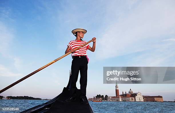low angle view of gondolier - gondel stock-fotos und bilder