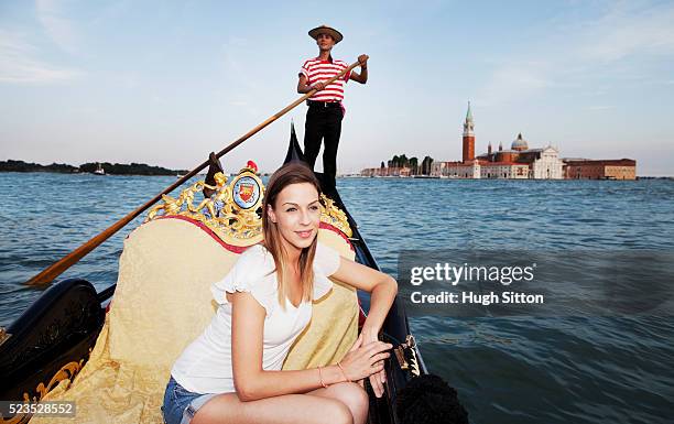 young tourist woman on gondola - gondel stock-fotos und bilder