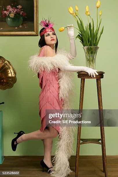 young woman wearing outfit of the twenties - boa stock pictures, royalty-free photos & images