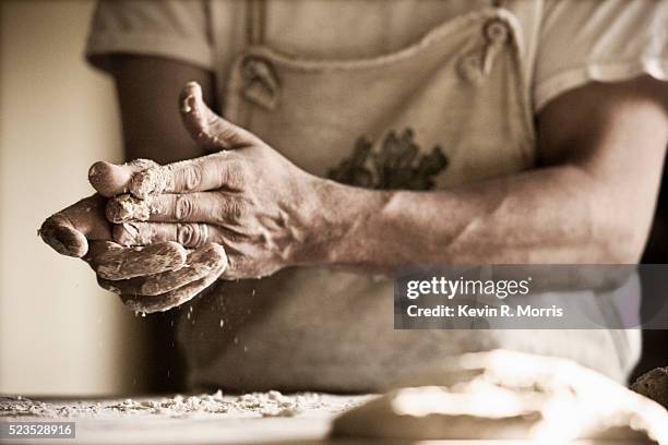 baker at work - artisanal food and drink stock pictures, royalty-free photos & images