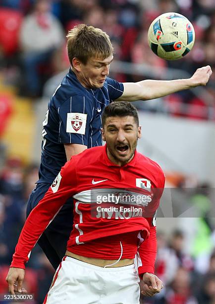 Salvatore Bocchetti of FC Spartak Moscow challenged by Yevgeni Lutsenko of FC Mordovia Saransk during the Russian Premier League match between FC...