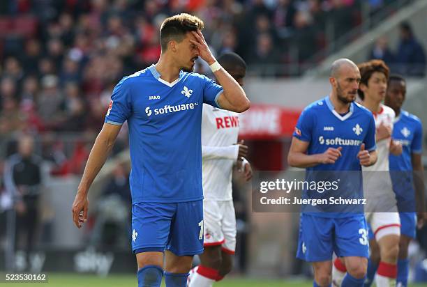 Sandro Wagner of Darmstadt covers his eyes during the Bundesliga match between 1. FC Koeln and SV Darmstadt 98 at RheinEnergieStadion on April 23,...