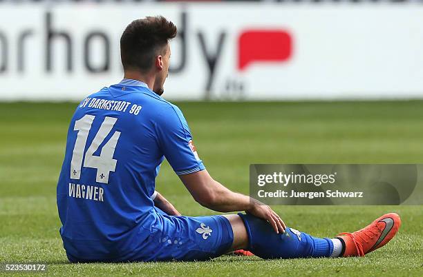 Sandro Wagner of Darmstadt sits on the pitch during the Bundesliga match between 1. FC Koeln and SV Darmstadt 98 at RheinEnergieStadion on April 23,...