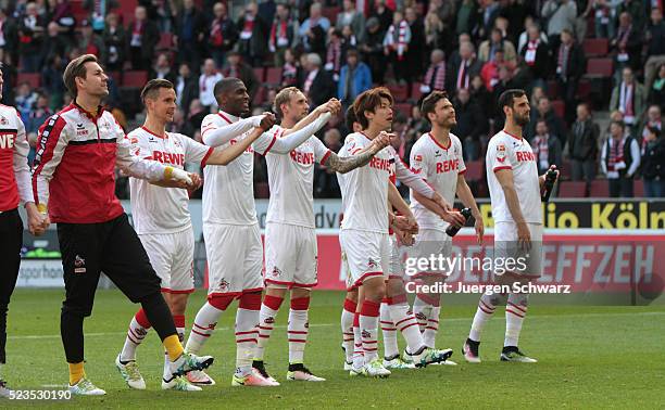 Players of Cologne greet their fans after the Bundesliga match between 1. FC Koeln and SV Darmstadt 98 at RheinEnergieStadion on April 23, 2016 in...