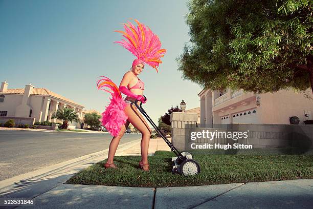 showgirl mowing lawn - ショーガール ストックフォトと画像