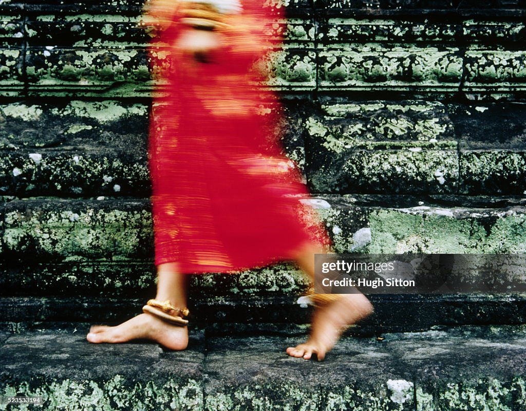 Young Woman Wearing Traditional Dress at Temple