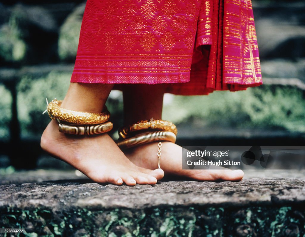 Young Buddhist Woman Wearing Gold Anklets