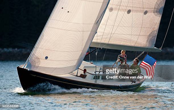 sailing - american flag ocean stock pictures, royalty-free photos & images
