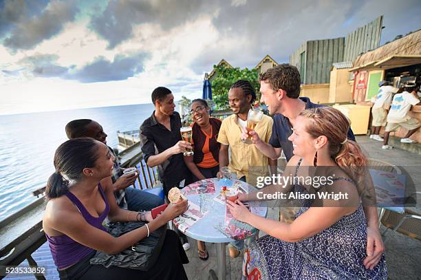 friends at margaritaville bar, jamaica - montego bay stock pictures, royalty-free photos & images
