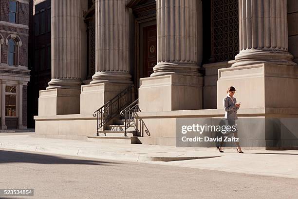 woman texting and walking - up the skirt pics stock pictures, royalty-free photos & images