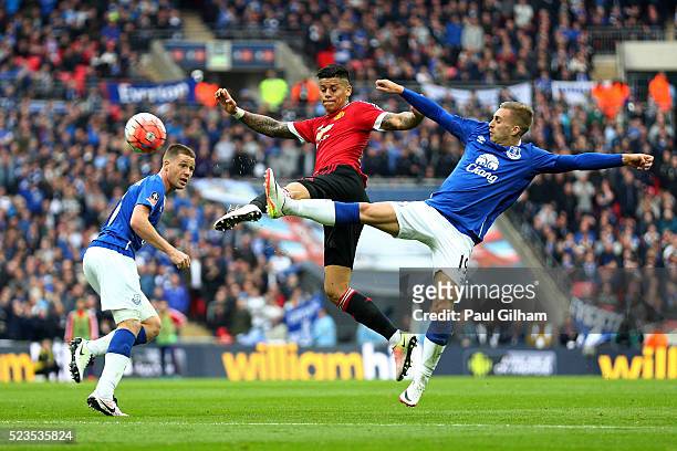Gerard Deulofeu of Everton and Marcos Rojo of Manchester United battle for the ball during The Emirates FA Cup semi final match between Everton and...