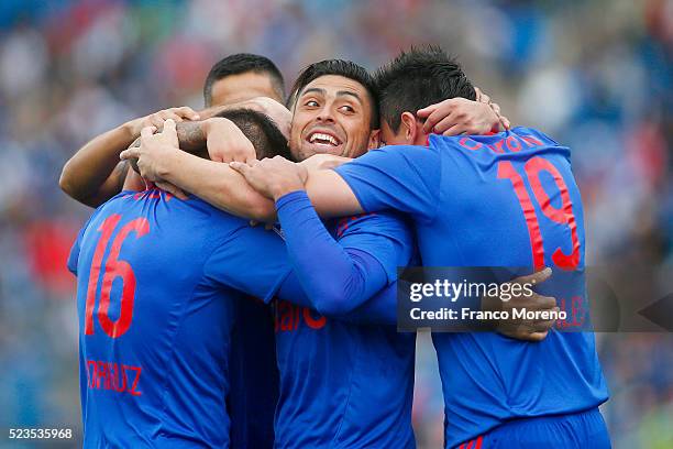 Matias Rodriguez of U de Chile celebrates with his teammates after scoring the first goal against U Catolica during a match between U Catolica and U...