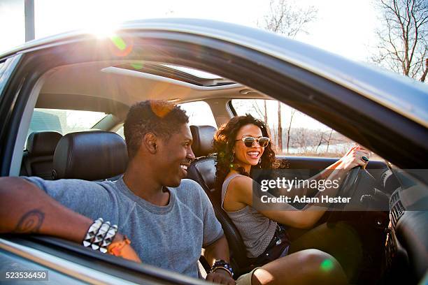 couple in car - driving romance stock-fotos und bilder