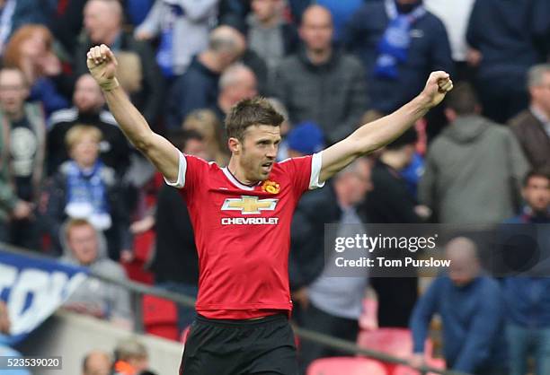 Michael Carrick of Manchester United celebrates at the final whistle of the Emirates FA Cup Semi Final match between Manchester United and Everton at...