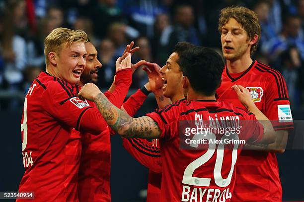 Karim Bellarabi of Leverkusen celebrates his team's second goal with team mates Julian Brandt, Javier Hernandez, Charles Aranguiz and Stefan...