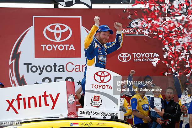 Dale Earnhardt Jr., driver of the Hellmann's Chevrolet, celebrates in Vitory Lane after winning the NASCAR XFINITY Series ToyotaCare 250 at Richmond...