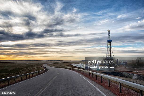 drilling fracking rig at sunrise - texas shale stock pictures, royalty-free photos & images