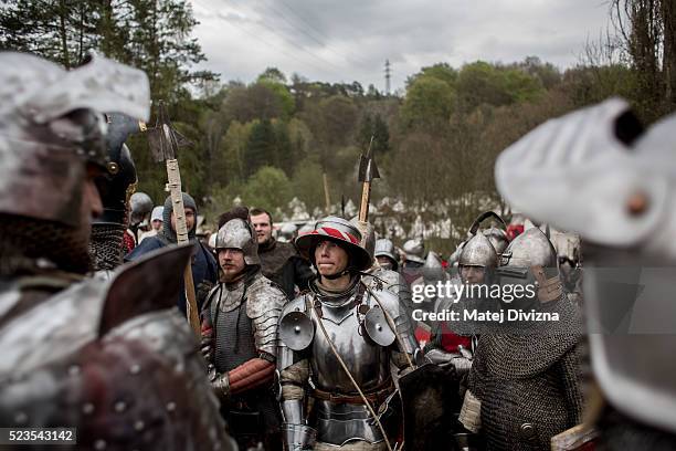 Medieval enthusiasts prepare for the reenactment of a medieval battle in the Czech Republic on April 23, 2016 in Libusin, Czech Republic. About 2000...