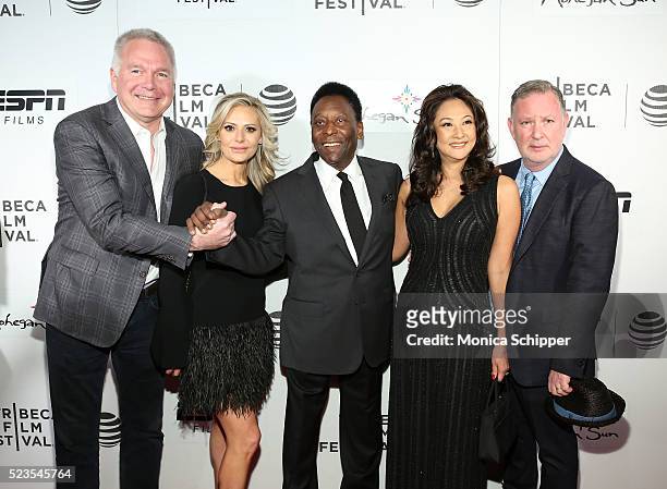 Former Brazilian footballer Pele and Marcia Aoki pose with guests at the "Pele: Birth of a Legend" Premiere during the 2016 Tribeca Film Festival at...