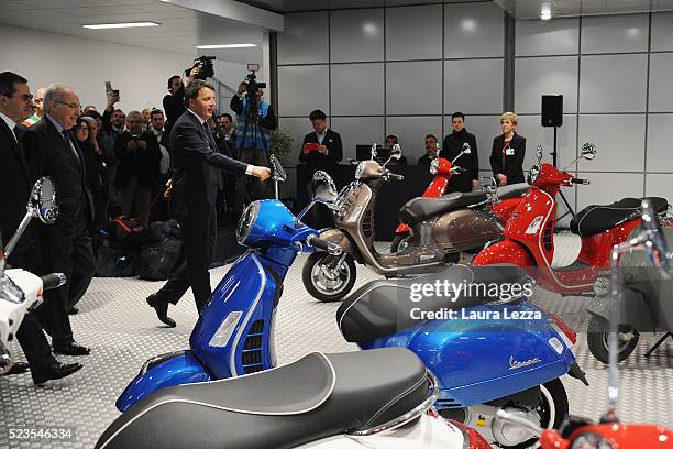 Italian Prime Minister Mateo Renzi attends the celebration of 70 years of the scooter Vespa Piaggio plant on April 23, 2016 in Pontedera, Italy....