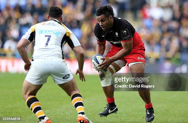 Billy Vunipola of Saracens, takes on George Smith during the European Rugby Champions Cup semi final match between Saracens and Wasps at Madejski...
