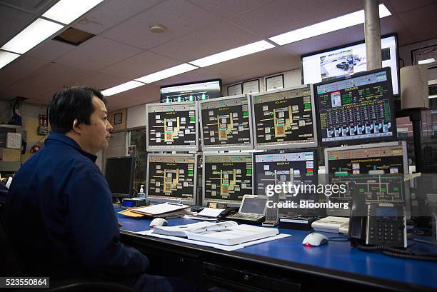 Worker monitors engines in the control room of the Enwave Energy Corp. Steam plant in Toronto, Ontartio, Canada, on Friday, April 8, 2016. Enwave...