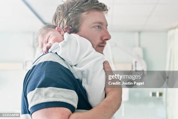 father with newborn baby - archival hospital stock pictures, royalty-free photos & images